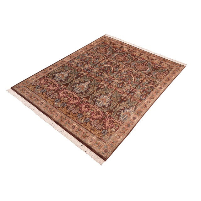 Designed with mesmerizing intricacy and gorgeous color palette, this hand-knotted masterpiece demonstrates the beauty and...