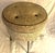 Add a touch of classic mid-century style and functionality to your home with this vintage swivel sewing bench. Featuring a...