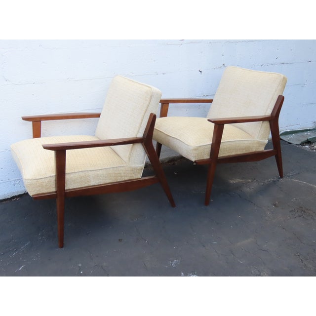 This Pair of Side Chairs is made out of wood, solid wood, and upholstery. This Chairs have a Mid Century Modern style and...