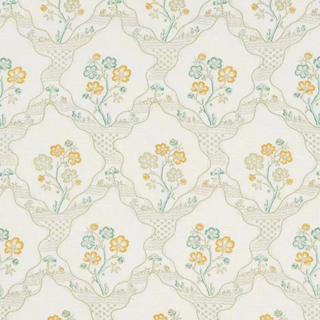 An eccentric, wavy trellis pattern, Marella is enlivened by charming botanical motifs. Also available as a wallcovering....
