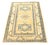 Add distinct visual character to your interiors with this finely hand-knotted 2'9" x 4'2" rug from our Ariana Hazara...