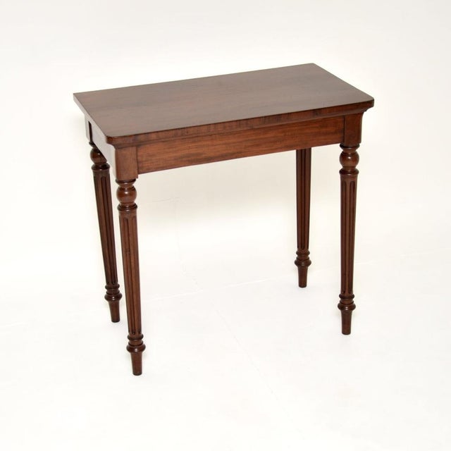 An outstanding antique Victorian console table, made in England and dating from around the 1840-1850 period. It is of...