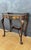 Elegant Louis XV style carved wood side table featuring a refined gallery top and gracefully curved cabriole legs. Richly...