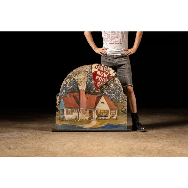 Vintage painted dimensional advertising display created to promote saving toward the purchase of a home. The freestanding...