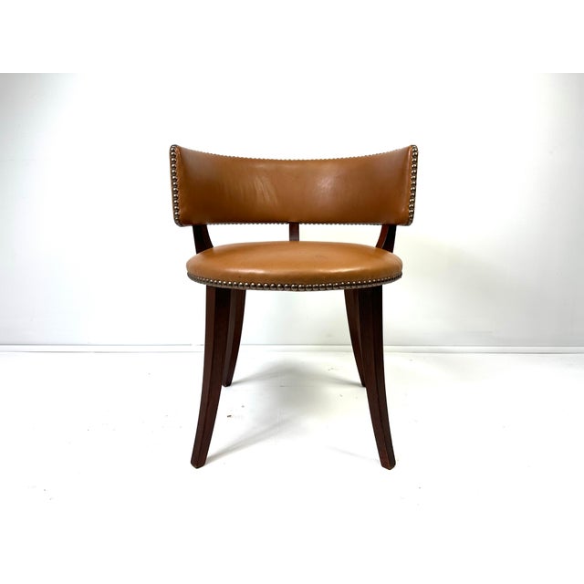 1940’s Danish dressing chair attributed to Magnus Laessoe Stephensen. Cognac leather with nailheads. Stained Birch frame....
