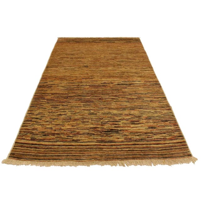 With strict standards of craftsmanship and quality of materials used this modern inspired hand knotted Gabbeh rug is a...