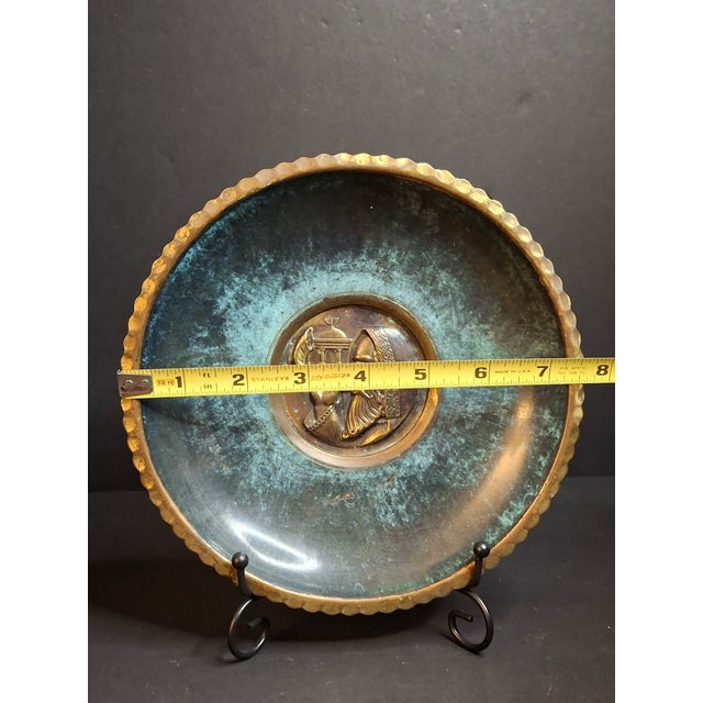 A notable piece of early Israeli decorative art by the iconic Pal-Bell foundry. The dish features a scalloped/crimped...