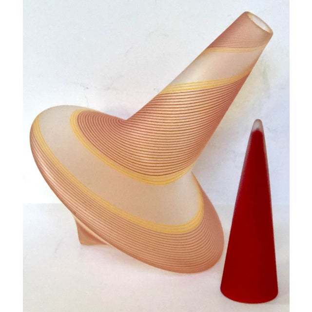 California artist, Pamina Miye Traylor, made this whimsical blown and acid etched glass decanter in the image of a...