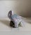 Lovely pair of bird figurines in shades of lavender. Perfect for mantle , bookcase or broken up on tabletops.