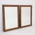 A fine pair of Biedermeier mirrors. Walnut veneer with ebonized edge profile. The inset mirrors have a slightly darkened,...