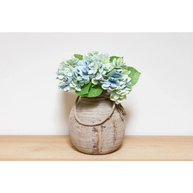 This charming antique carved wood pot was crafted from teak and originally used in Village kitchens in North India to...