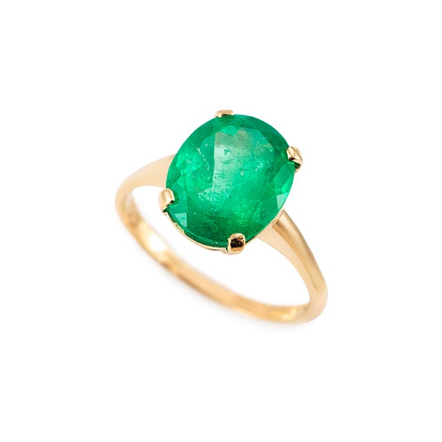 Gender: Ladies Metal Type: 14K Yellow Gold Ring Size: 9 Thick: 1.80 mm Weight: 3.50 grams Ladies 14K yellow gold, emerald...