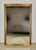 Elegant large Spanish wall mirror featuring a finely crafted giltwood frame with carved decorative mouldings and a warm...