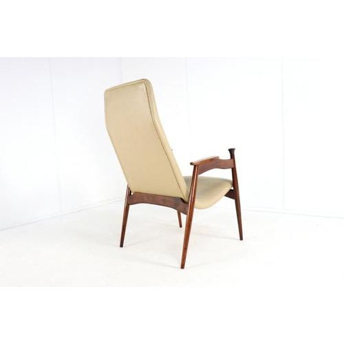 A beautifully designed Mid Century armchair is how we best describe this model. This armchair with its special details in...