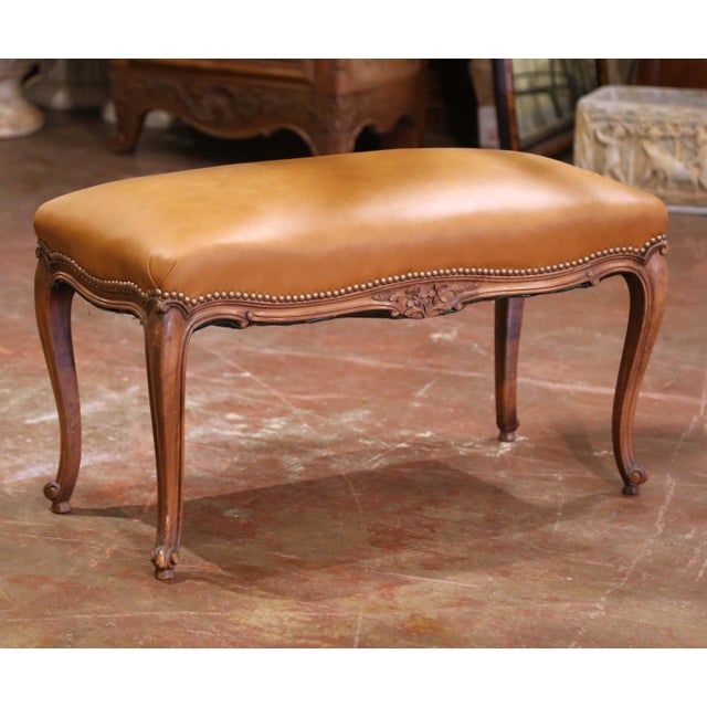 This refined French bench was crafted in Provence circa 1920, embodying the graceful elegance of the Louis XV style. Built...