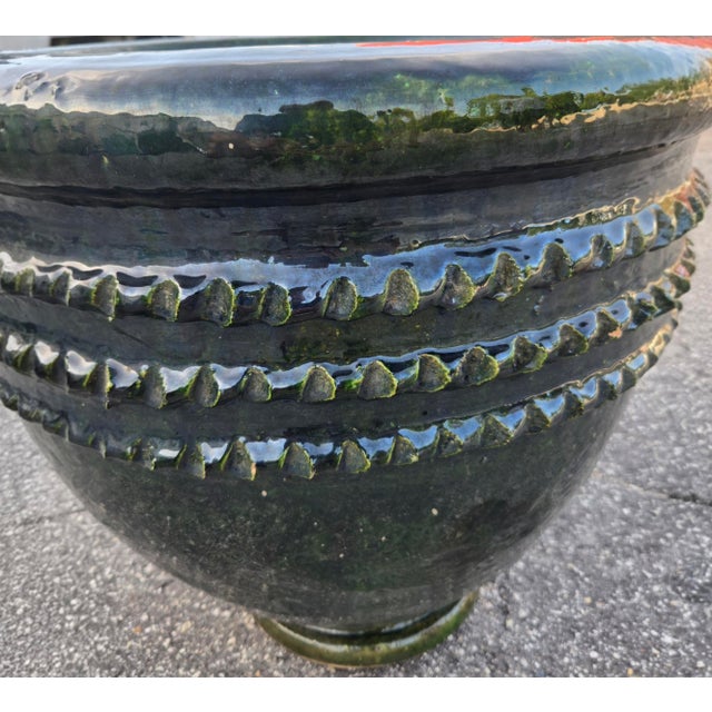 Bring authentic Moroccan craftsmanship to your home or garden with this beautiful handcrafted pottery planter. Finished in...