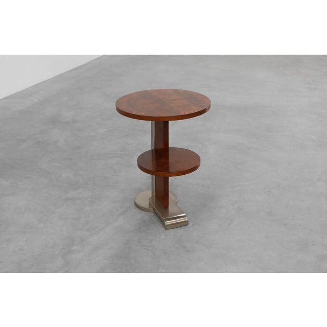 France / 1925 / side table / wood, veneer, chrome / Art Deco Two-tiered round side table from the 1920s in the style of...