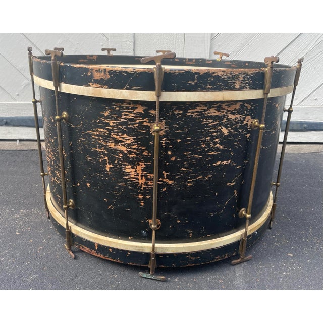 An antique large wood bass drum, measuring 26" x 17" (18 1/2" including the tightening turnbuckle). This great vintage...