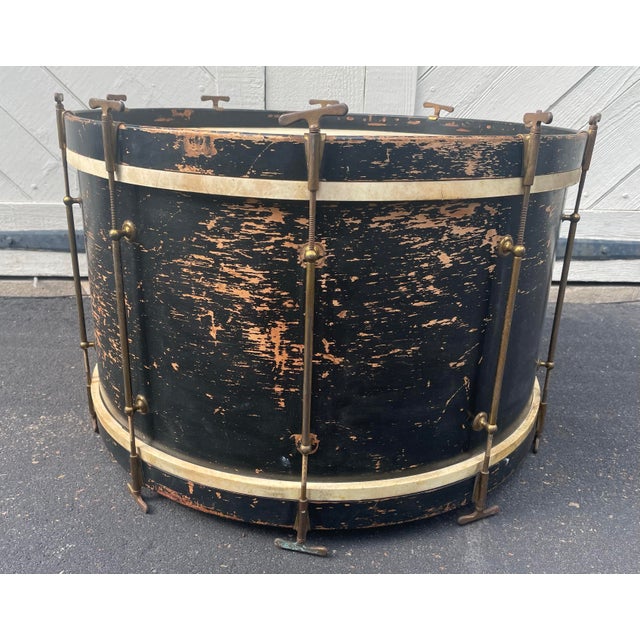 An antique large wood bass drum, measuring 26" x 17" (18 1/2" including the tightening turnbuckle). This great vintage...