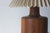 A table lamp with a minimalist, organic form that evokes Scandinavian design from the second half of the 20th century. Its...