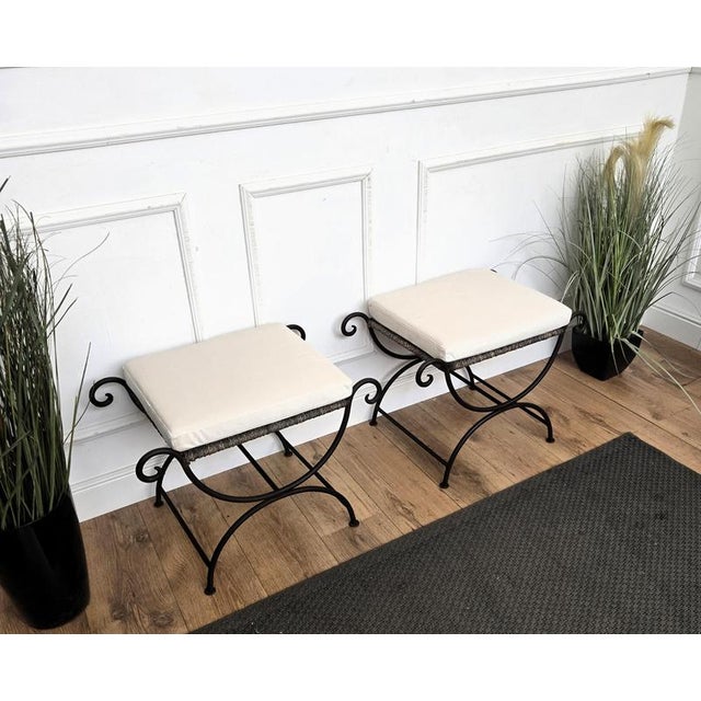Beautiful pair of Italian neoclassical style curule savonarola wrought Iron stools, bench or window seat with its typical...