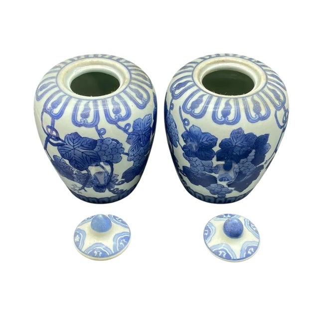 Mid 20th Century Pair of Vintage Chinese Qing Dynasty Blue and White Grape Leaf Motif Jars For Sale - Image 5 of 7