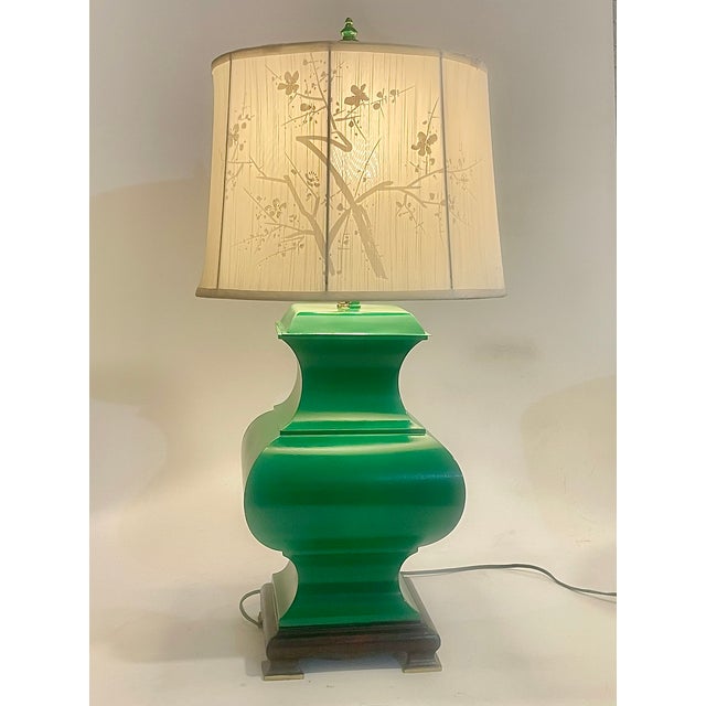 This striking vintage mid-century table lamp is as elegant as it is bold. Crafted from metal with a smooth, vibrant...