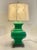 This striking vintage mid-century table lamp is as elegant as it is bold. Crafted from metal with a smooth, vibrant...