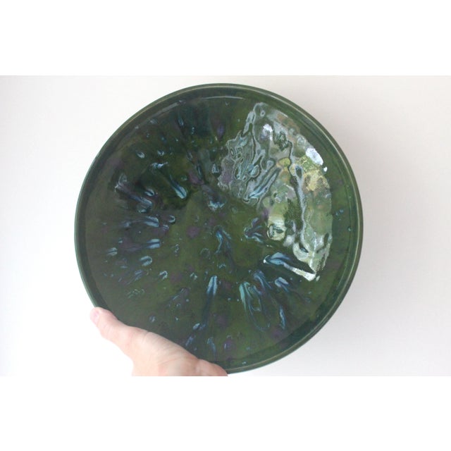 Fabulous green handmade mid century pottery bowl with a unique green colour and gorgeous drip glaze. Very useful size for...
