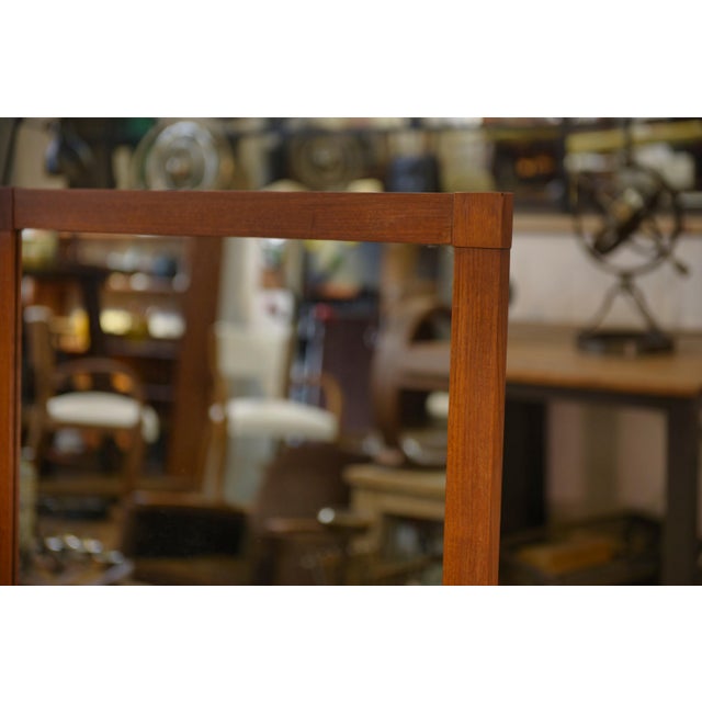 Scandinavian teak mirror with ceramic insert, 1960s. Large vertical format, slim and inviting frame, easy to place on the...