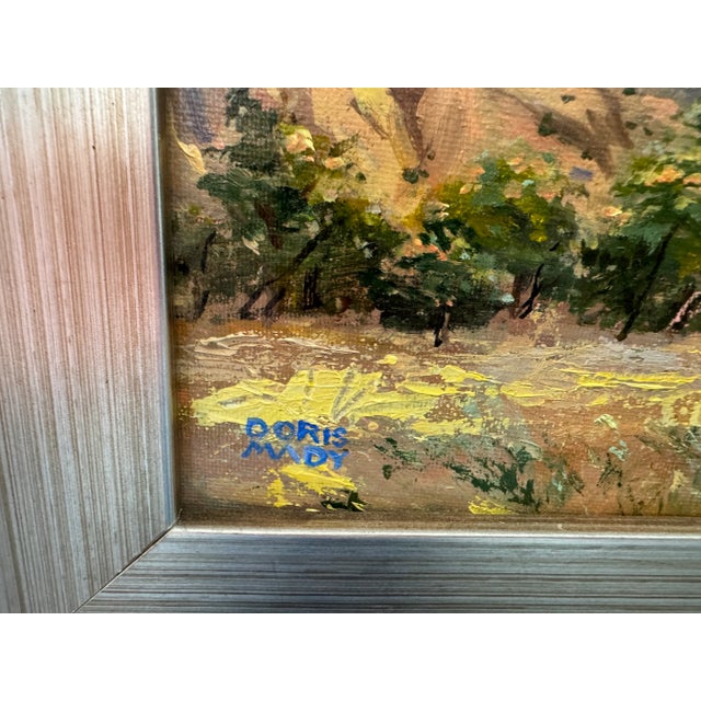 Brilliant color and light level up this otherwise traditional plein air painting. Signed on recto. Framed in silver-...