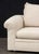 Modern Beige Fabric Upholstered Three-Seat Sofa, with three throw pillows. 28" H x 93" W x 46" D; seat: 20" H. Provenance:...