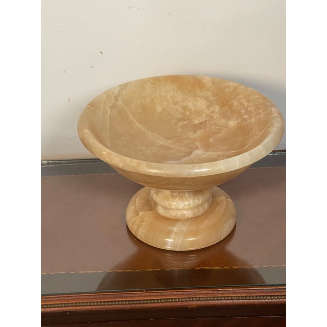 Nature’s Beauty Sea shells globe arrangement on a large Italian onyx Tazza.