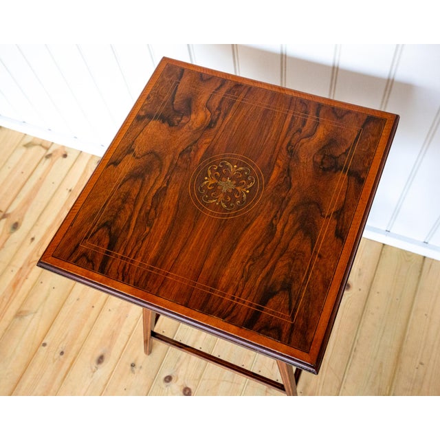 A very attractive antique inlaid rosewood side or lamp table in lovely condition. Likely made in england in the edwardian...
