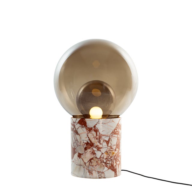 Sebastian Herkner’s boule is a pure homage to the traditional French Pétanque game, a version of boule. The object toys...