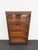 This Lawyer Bookcase is made of wood, solid wood, veneer, and glass. The cabinet is labeled that it was made by Globe...