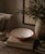 A remarkable piece of corporate and ceramic history, this hand-made terracotta bowl was produced by the Fulham Pottery —...