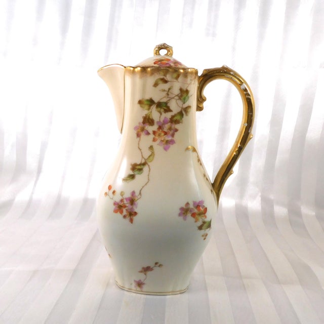 This is C H Field Haviland a Gerard Dufraisseix and Morel chocolate pot with four chocolate cups and saucers in an unknown...