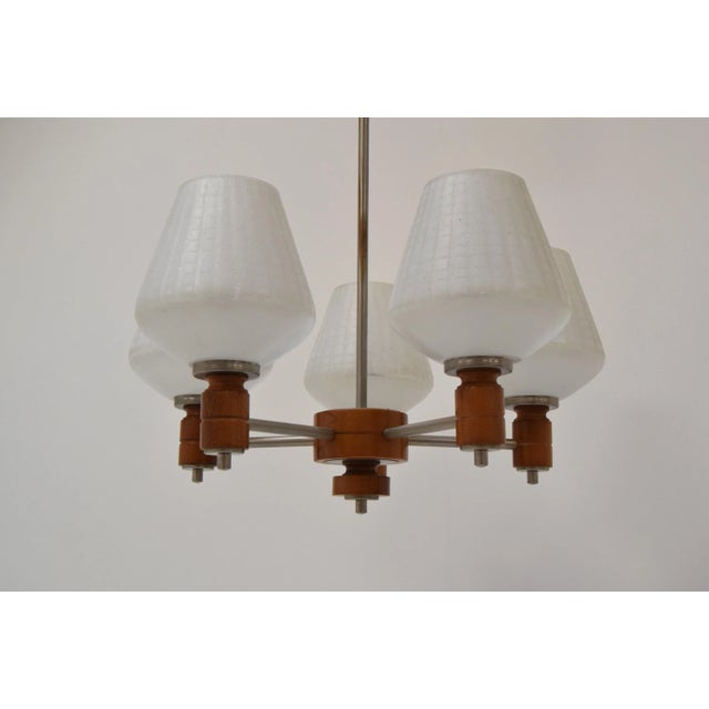 Made in Czechoslovakia. Made of metal, glass and wood. Original condition. Re-polished. US wiring compatible 5x60w, e27 or...