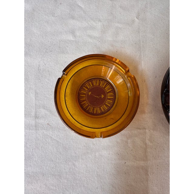 Up for consideration is a beautiful pair of amber colored ashtrays. These would look lovely on display in your home and...