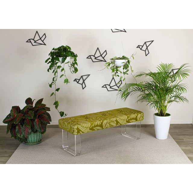 Sophisticated waterfall Lucite bench upholstered in a high end cadmium green chenille textile with foliage motif....