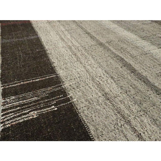 Galerie Shabab Collection Mid-20th Century Turkish Tribal Kilim Room Size Carpet in Charcoal and Brown For Sale In New York - Image 6 of 10