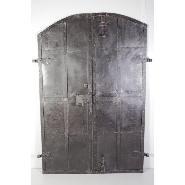 Completely restored iron clad doors made for a butcher in Olesnice, Moravia by local blacksmith into specific available...