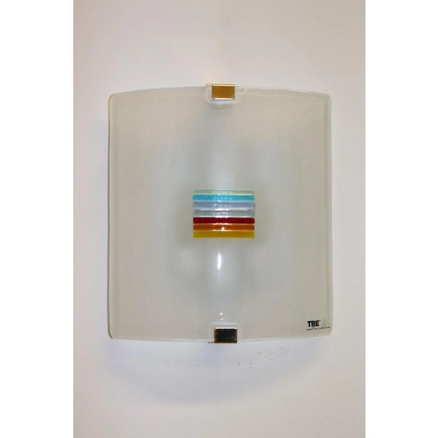 1990s Wall Lamp Murano White Frosted Glass with Multicolor Center Accents. White Lacquered metal mounting with golden...