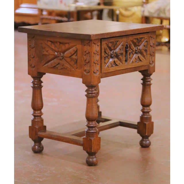 This handsome Louis XIII style side table was crafted in France circa 1960 and reflects the enduring appeal of traditional...