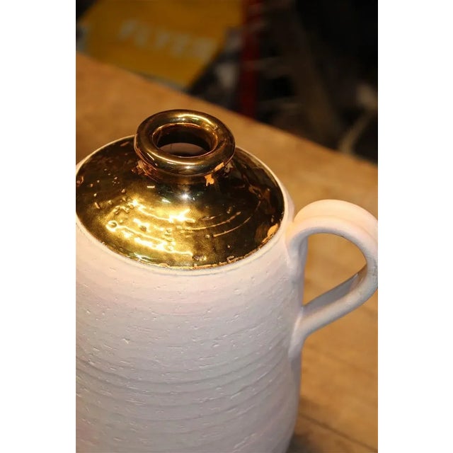 Italian Vase in Pink Ceramic and Gold by Aldo Londi for Bitossi, 1970s, in Flawless conditions. Designed 1970 to 1979 This...