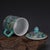 Add a pop of color to your morning routine or decor collection with this charming ceramic lidded mug. This piece features...