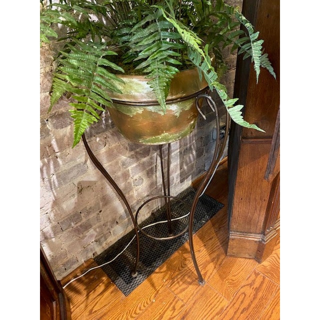 Lovely and low maintenance faux fern and metal plant stand. Would be a gorgeous addition to any room. Approx. 68" tall...