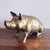 Vintage brass piggy bank, made in Korea in the 1960s. Lovely condition! 14” x 5” x 7”