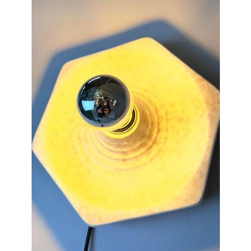 Original wall lamp from the 1970s by the renowned manufacturer Hustadt Leuchten. A distinctive design object from the...